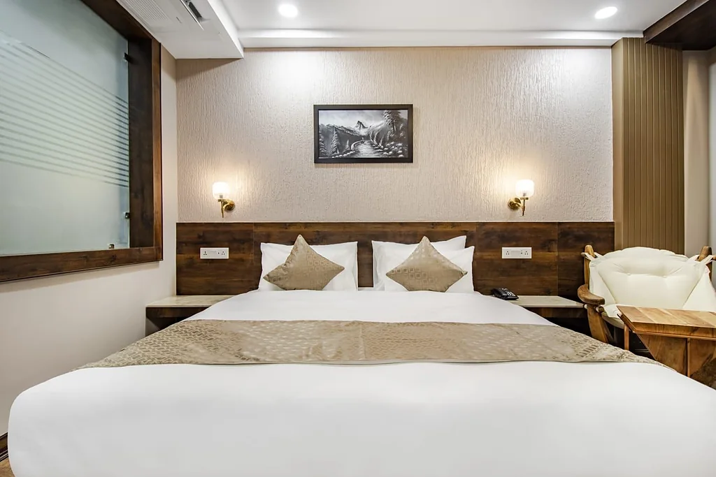 A premium cosy room with a comfortable double bed, en-suite bathroom, and the everyday essentials for a quiet stay.